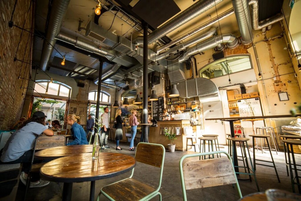 Indoors cafe with exposed ducting