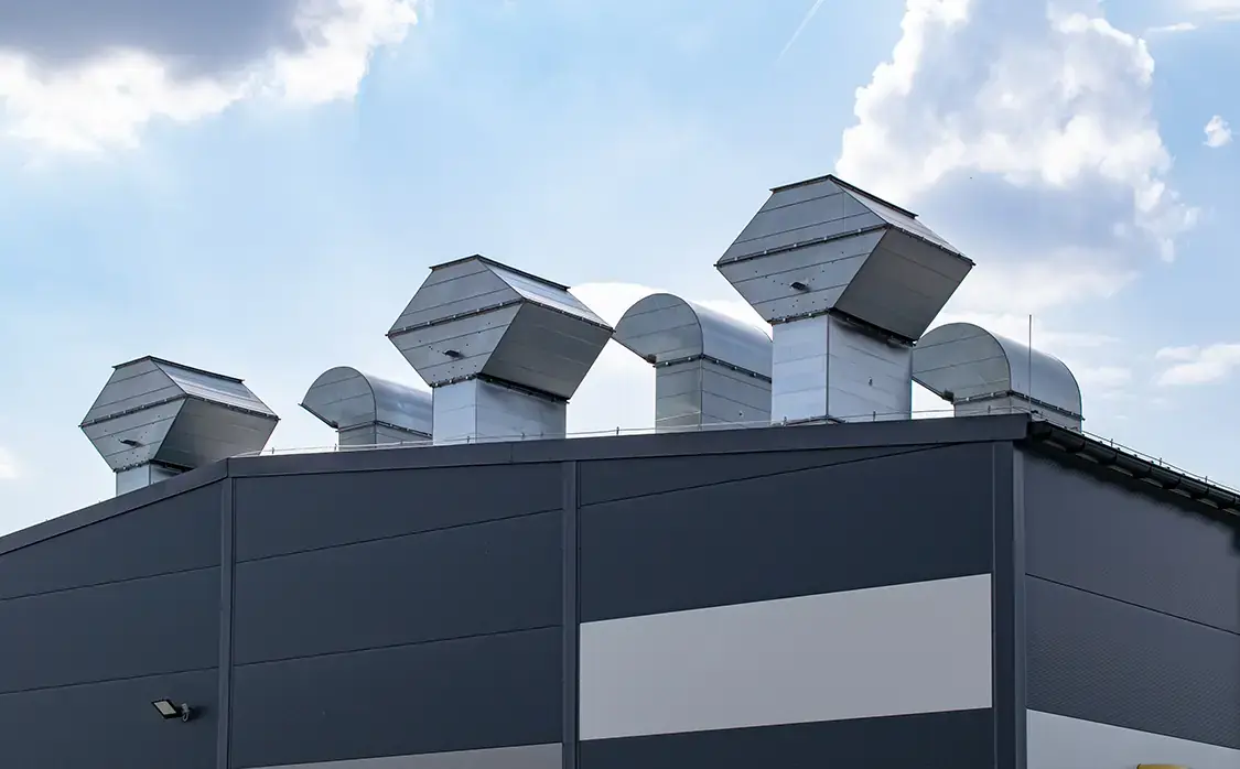 Vent terminals on roof of industrial building